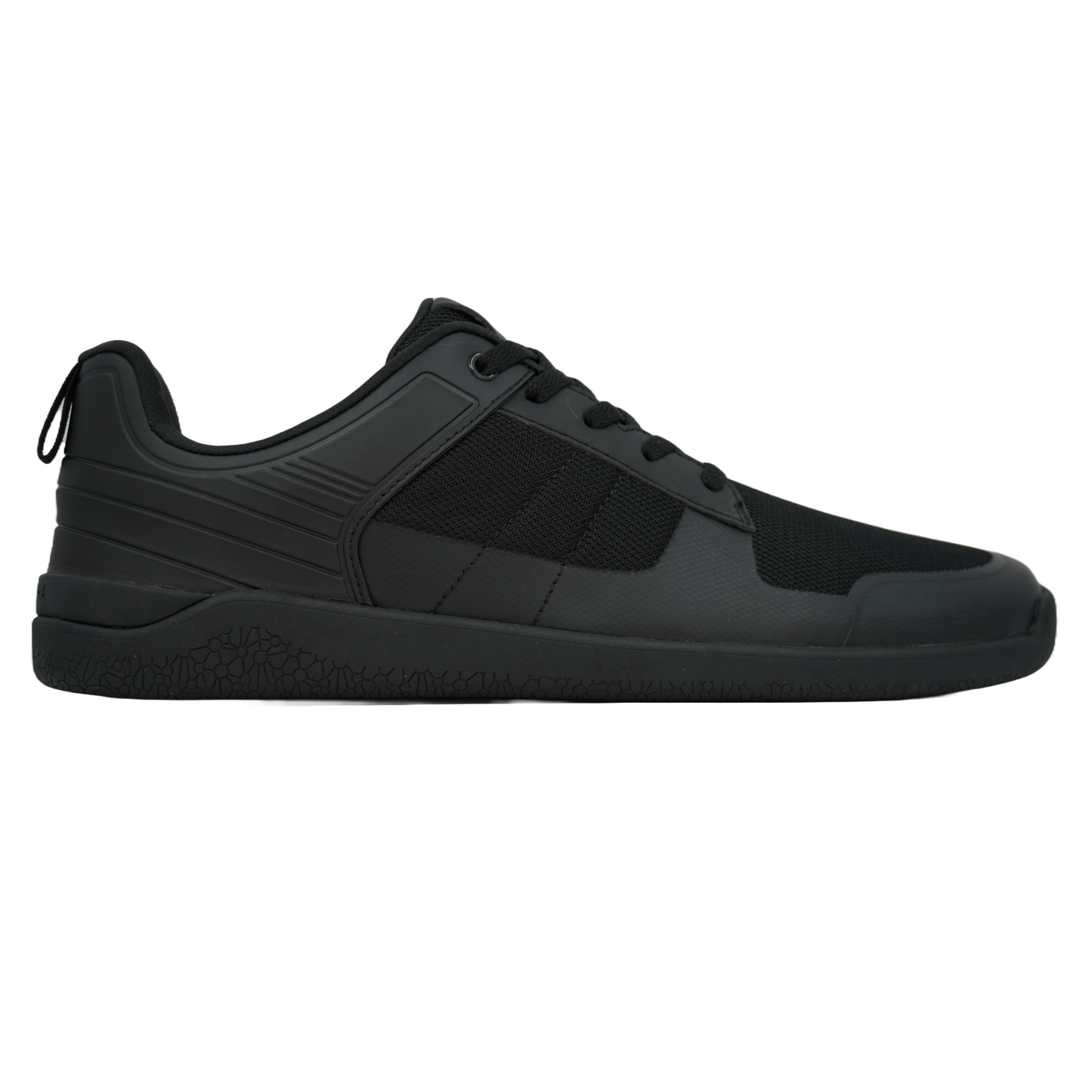 Chaussures barefoot noires offrant une sensation de marche pieds nus.