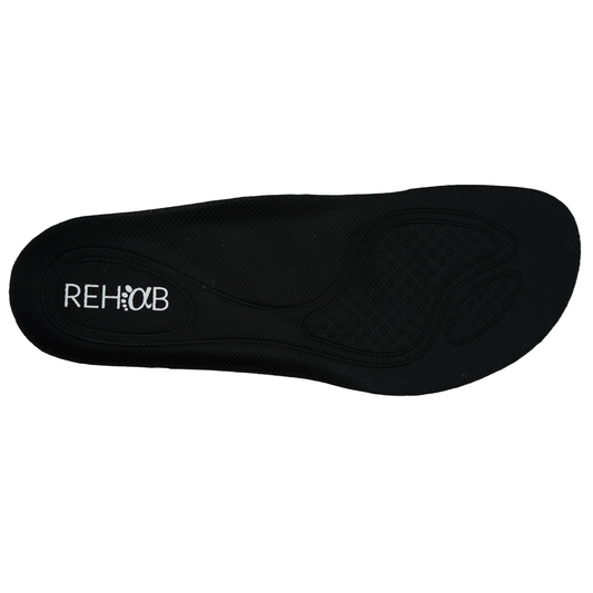 Semelle de transition pour chaussures barefoot, conçue pour préparer les pieds à une marche naturelle et sans contrainte.