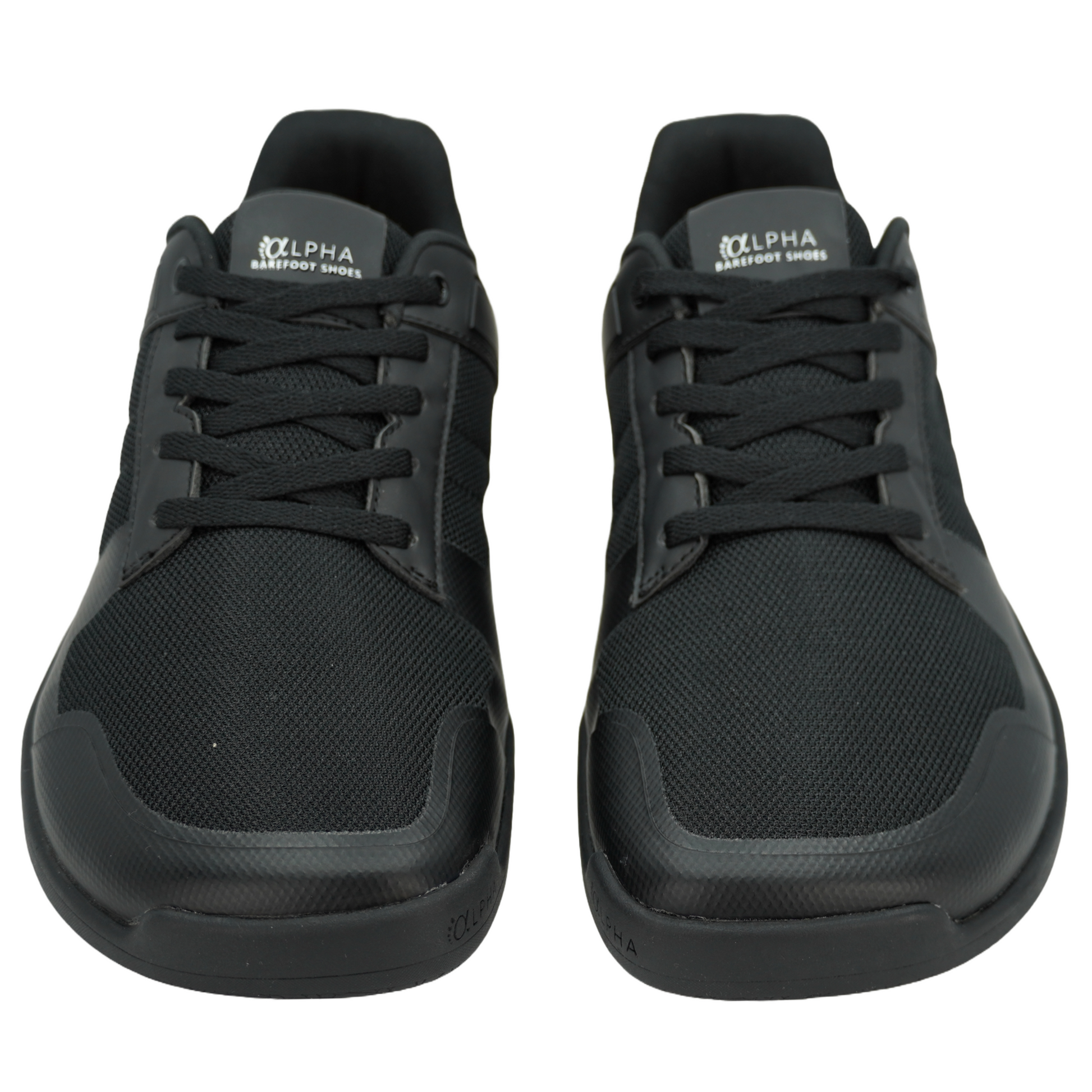 Chaussures minimalistes noires, parfaites pour une marche naturelle et sans contrainte.