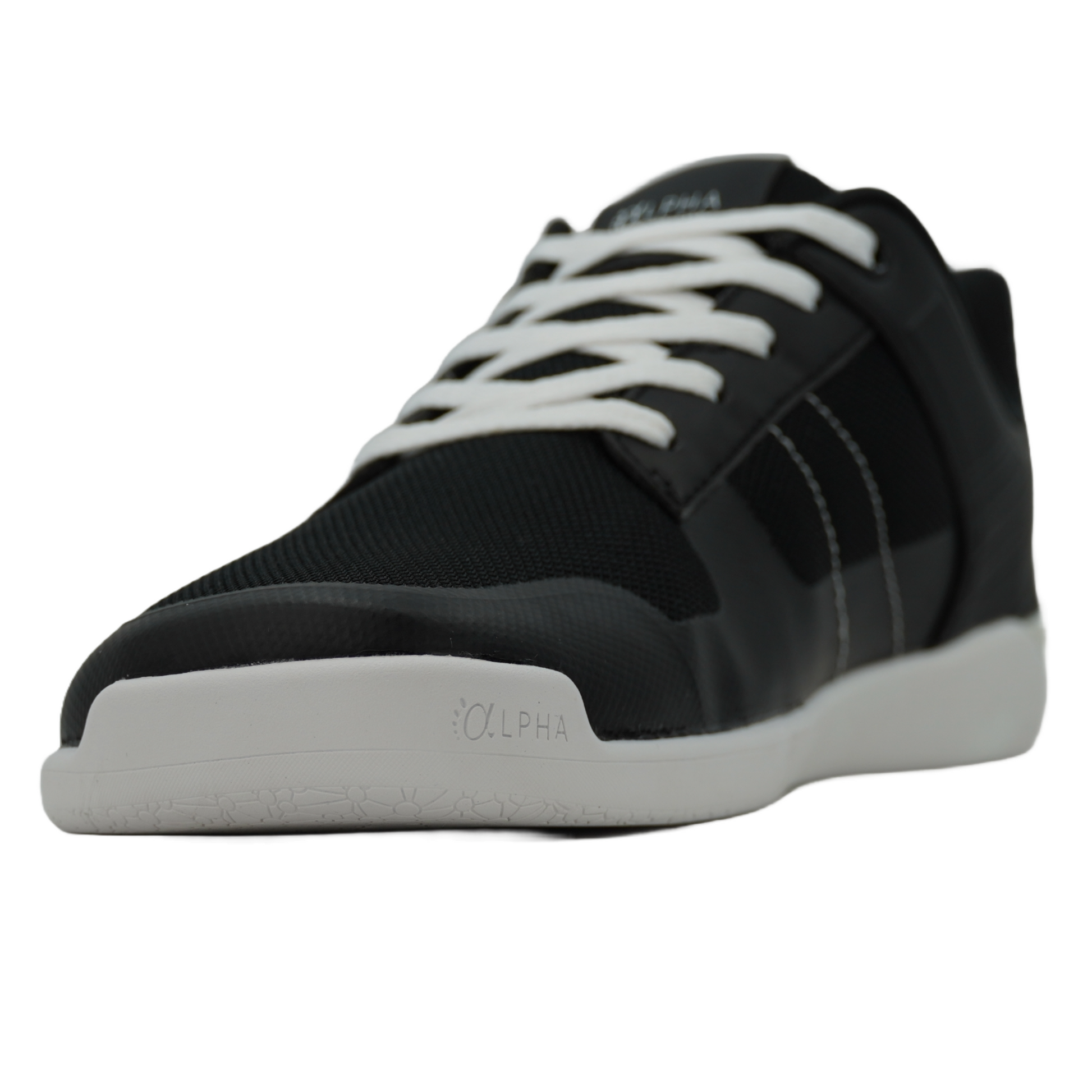 Chaussures barefoot bicolores noires et blanches, conçues pour une sensation de marche pieds nus.