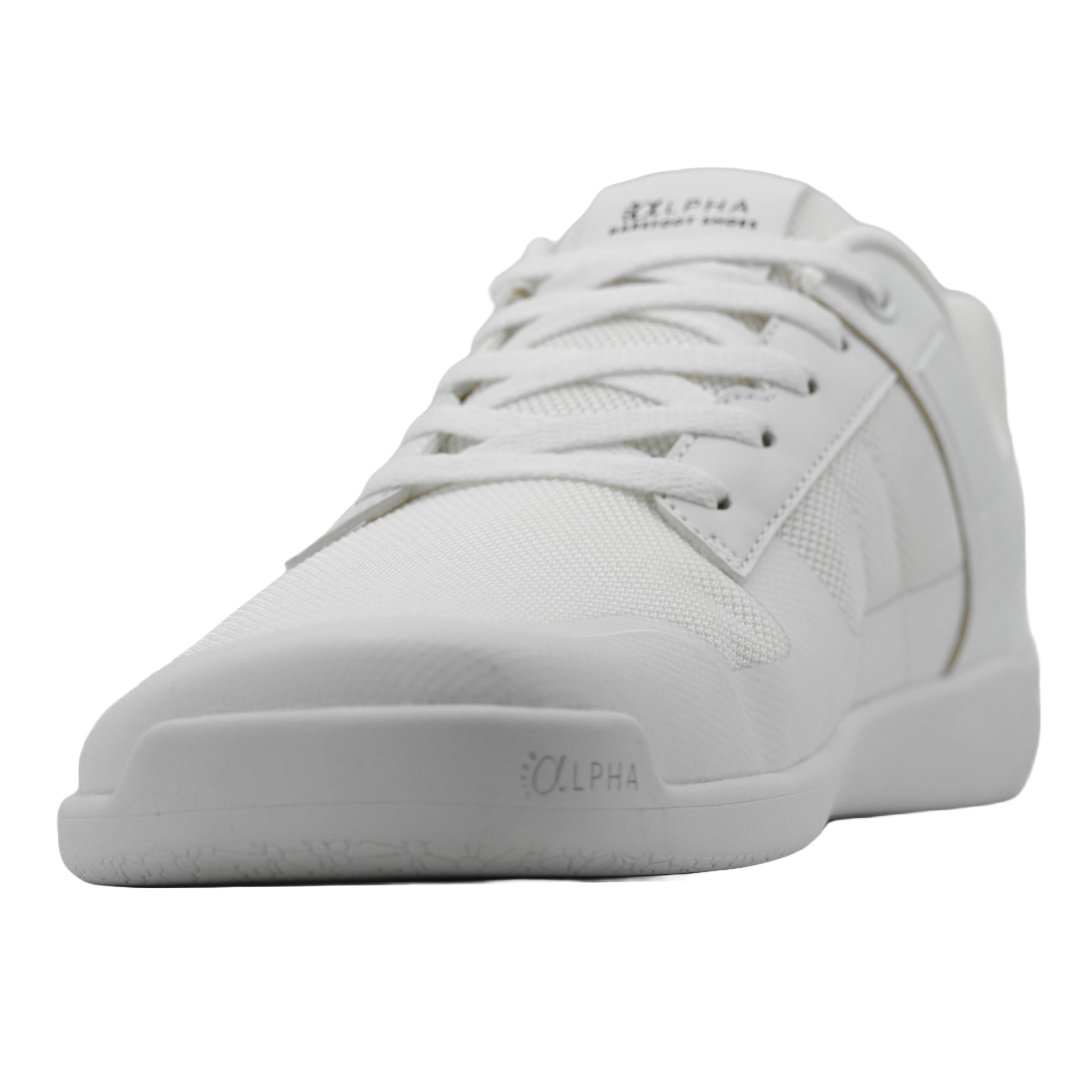 Détail de la chaussure barefoot blanche montrant sa boîte à orteils spacieuse, permettant un évasement naturel des orteils pour une meilleure stabilité.