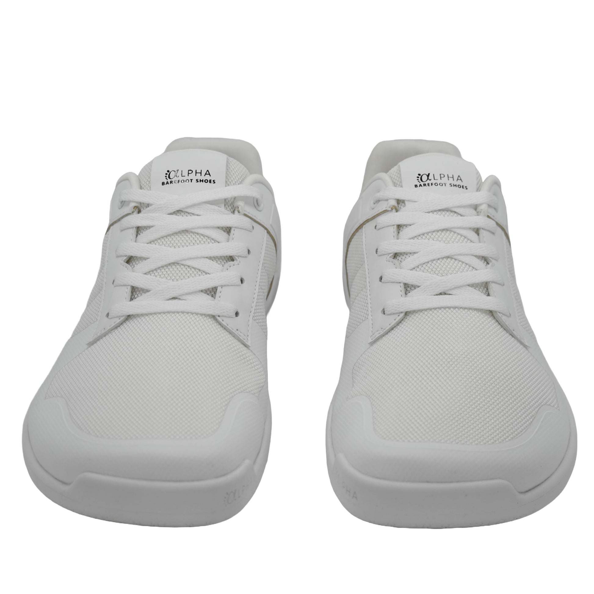 Une paire de chaussures barefoot blanches, parfaites pour ceux qui recherchent à la fois style et fonctionnalité, tout en respectant l'anatomie naturelle du pied.